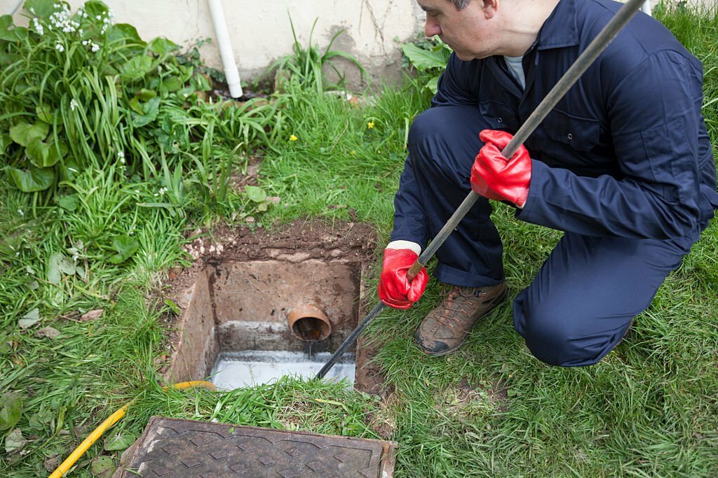 Drain being cleared